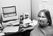 social worker by computer