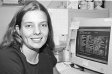 Medical social worker Yvone Speed by a computer