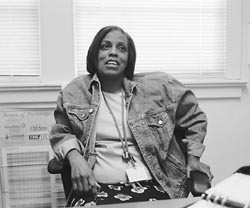 Nurse Beverly Sedlacek sitting behind her desk