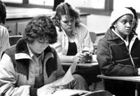 a student playing with a rubric cube