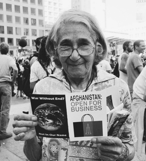 Hild Roberts nearly 90 standing in a demonstration agasint the war, nearly 90 years old